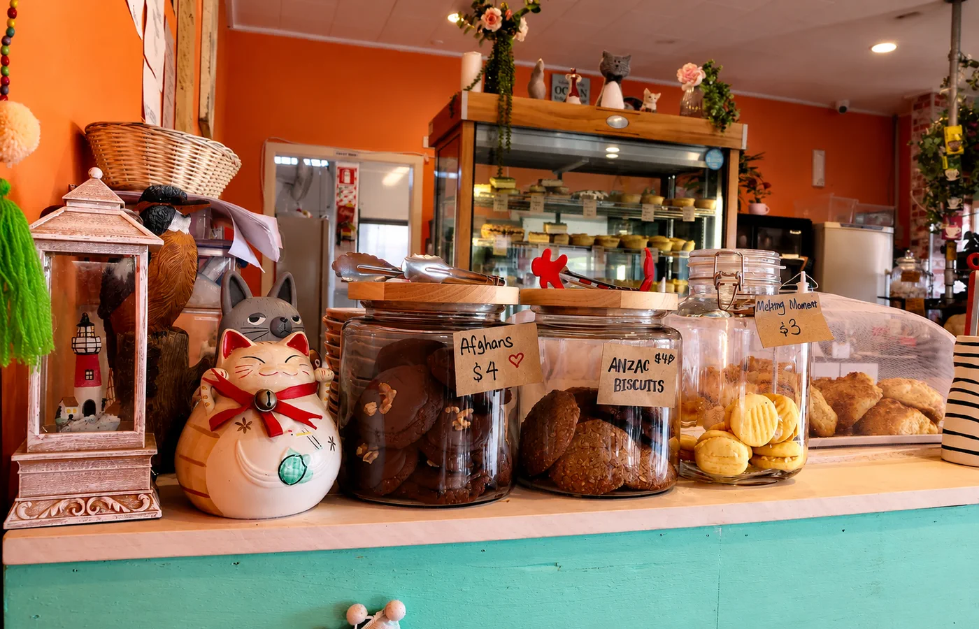 Cat ornaments, biscuit jars and cabinet treats across the Fat Cat counter