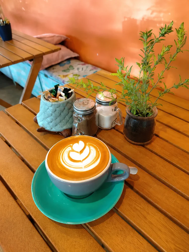 Coffee and a cabinet treat at Fat Cat Street Coffee