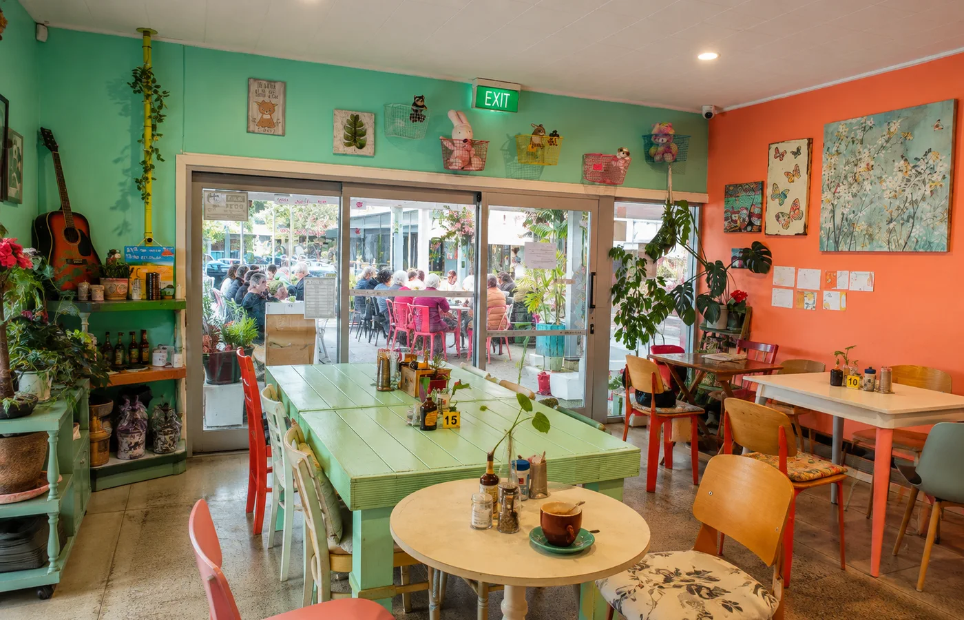 Customers enjoying the colourful indoor dining room